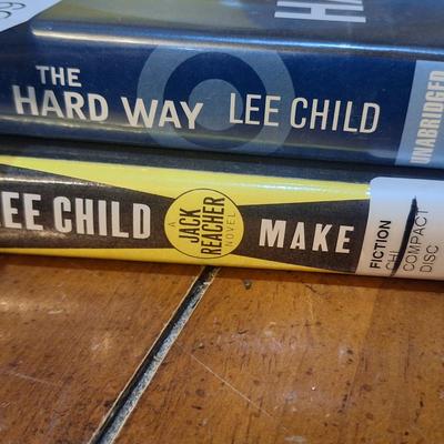 two Jack Reacher audiobooks by Lee Child: Make Me and The Hard Way.