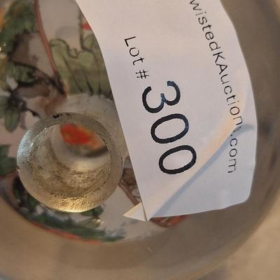 Chinese reverse hand-painted glass sphere, also known as an inside-painted glass ball or paperweight.