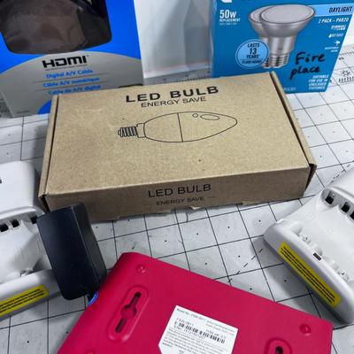 Odd Lot of Electronic Items: Bulbs, Switches, Charges