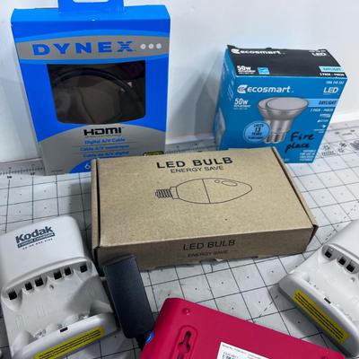 Odd Lot of Electronic Items: Bulbs, Switches, Charges