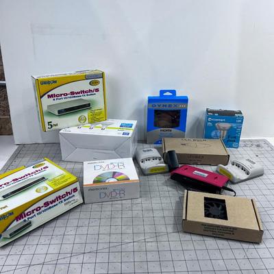 Odd Lot of Electronic Items: Bulbs, Switches, Charges