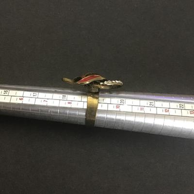 Sale Photo Thumbnail #164: Gold tone with red enamel and clear rhinestones ring
Please see attached photos