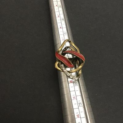 Sale Photo Thumbnail #163: Gold tone with red enamel and clear rhinestones ring
Please see attached photos