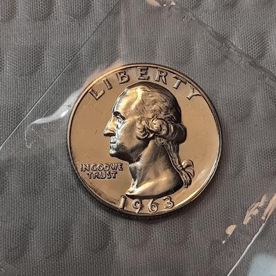 TWO 1963 UNC SILVER QUARTERS