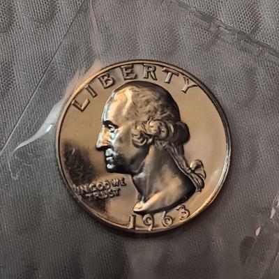 TWO 1963 UNC SILVER QUARTERS