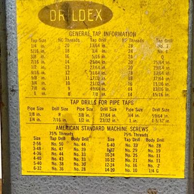 Sale Photo Thumbnail #563: All drill bits are used, some sizes are missing.  Box has slight corrosion on the outside, but is in solid condition.