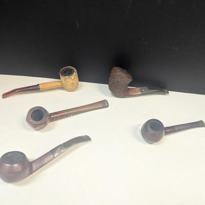 Collection Of Used Smoking Pipes