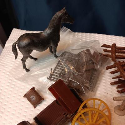 A VARIETY OF WESTERN PLAY FIGURES, CAMP SIGHT AND WAGON