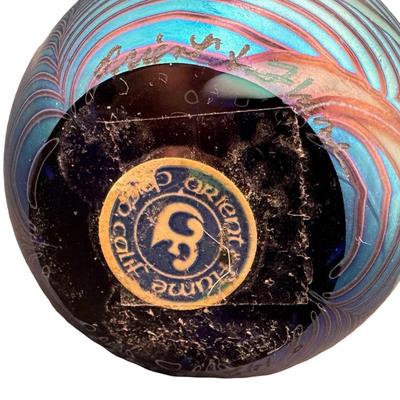 Sale Photo Thumbnail #6: Two pieces. One features a flamingo. The other is iridescent blue with white dogwood flowers. Measurement of largest: 4”H. Pre-auction estimate: $200-$400. [MA]