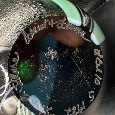 Sale Photo Thumbnail #4: Two pieces. One features a flamingo. The other is iridescent blue with white dogwood flowers. Measurement of largest: 4”H. Pre-auction estimate: $200-$400. [MA]