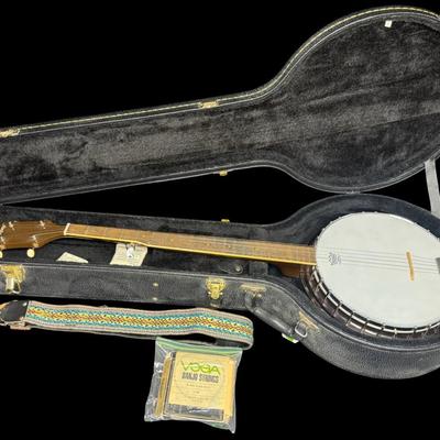 Sale Photo Thumbnail #18: This is most likely the Resonance-Tone model from the 1960s. It has a poplar neck, with ebonized maple fingerboard. Includes hard case. Pre-auction estimate: $75-$150. [KD]