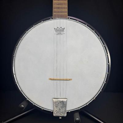 Sale Photo Thumbnail #14: This is most likely the Resonance-Tone model from the 1960s. It has a poplar neck, with ebonized maple fingerboard. Includes hard case. Pre-auction estimate: $75-$150. [KD]