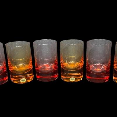 Sale Photo Thumbnail #22: Made in Czechoslovakia. Includes four amber and three rosaline colored glasses. Total of seven pieces. No obvious chips or cracks. Pre-auction estimate: $300-$600. [RE]