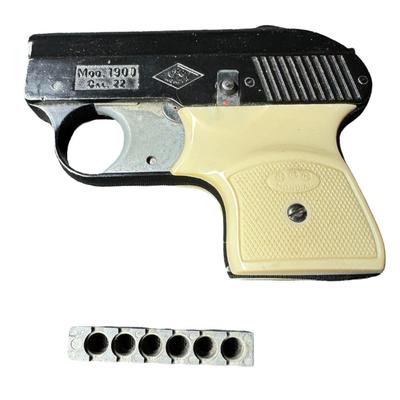 Sale Photo Thumbnail #27: This pistol is .22 caliber and shoots blanks. It was originally sold as a tear gas pistol. It includes one cartridge, the original box, and paperwork. Not tested. [KD]