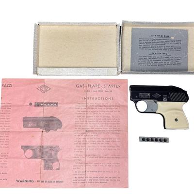 Sale Photo Thumbnail #26: This pistol is .22 caliber and shoots blanks. It was originally sold as a tear gas pistol. It includes one cartridge, the original box, and paperwork. Not tested. [KD]