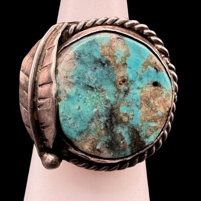Sale Photo Thumbnail #39: [8.12g] This ring features a flat, round turquoise stone in a traditional Southwest setting. The ring size is 6.5. Silver content confirmed using Niton XRF precious metals analyzer. [GD]
