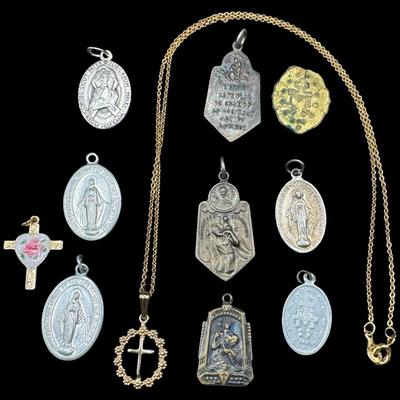 Sale Photo Thumbnail #47: Includes a gold tone necklace, an enameled heart/cross pendant, and nine medals. Total of 11 pieces. Some of the medals have a low silver content. [GD]