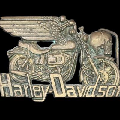 Sale Photo Thumbnail #49: Dated 1980, by Baron Belt Buckles. Solid brass construction. Measurement: 4”L x 2.5”W. Pre-auction estimate: $50-$75. [KD]