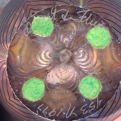 Sale Photo Thumbnail #61: Three pieces. One depicts a butterfly; one is iridescent with flower and feathers; and one is iridescent with pulled feathers. Measurement of largest: 3.5” Diameter. Pre-auction estimate: $300-$500. [MA]