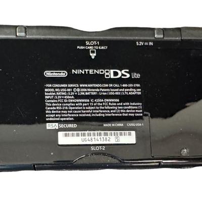 Sale Photo Thumbnail #63: Includes DS Lite, four games, A/C charger, and instruction manuals. Not tested. Pre-auction estimate: $50-$70. [KD]