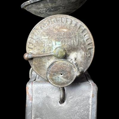 Sale Photo Thumbnail #67: This cap has the original “AutoLite” carbide lamp. The cap and lamp have age related wear. There is no glass lens on the lamp. Not tested. [KD]