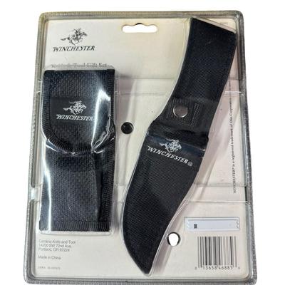 Sale Photo Thumbnail #71: This is unopened. The multi-tool has 15 features. The fixed blade knife measures 8” long. Both have sheaths. Pre-auction estimate: $40-$60. [KD]