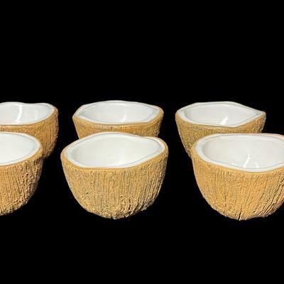 Sale Photo Thumbnail #79: Made in Italy. These have a rough brown exterior, like that of real coconuts. Total of six pieces. No obvious chips or cracks. Measurement: 2.5”H x 4” Diameter (each). Pre-auction estimate: $75-$150. [KD]