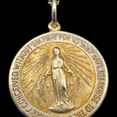 Sale Photo Thumbnail #90: [2.90g] This necklace features a religious pendant on a delicate cable chain. Length of chain: 20”L. Gold content confirmed using Niton XRF precious metals analyzer. [GD]