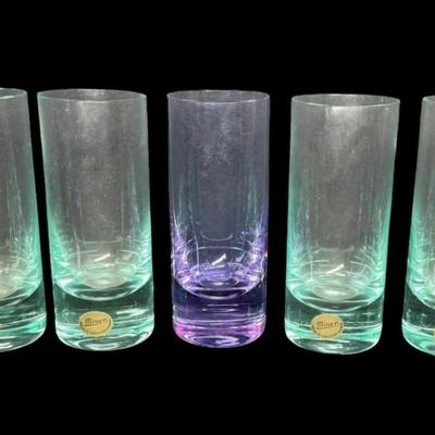 Sale Photo Thumbnail #103: Made in Czechoslovakia. Includes six ocean blue colored glasses, and one amethyst colored glass. Total of seven glasses. No obvious chips or cracks. Measurement: 5”H (each). Pre-auction estimate: $200-$300. [RE]