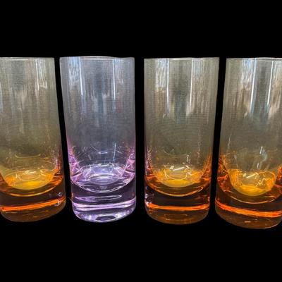 Sale Photo Thumbnail #108: Made in Czechoslovakia. Includes three amber colored glasses, and one Alexandrite colored glass. Total of four pieces. No obvious chips or cracks. Measurement: 6”H (each). Pre-auction estimate: $150-$200. [RE]