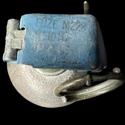 Sale Photo Thumbnail #123: Includes two believed to be practice grenades. One is a U.S. M21, and the other is a U.S. M67 fragmentation grenade. Age related wear. [KD]