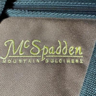 Sale Photo Thumbnail #140: This is signed by George Looney, and features walnut construction with faux mother of pearl tuners. There is a paper label on the inside. Gently used. Includes original case. Pre-auction estimate: $200-$300. [SR]