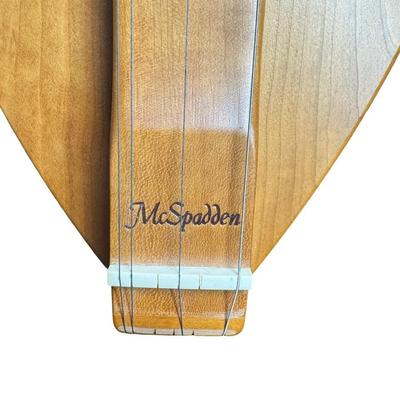 Sale Photo Thumbnail #137: This is signed by George Looney, and features walnut construction with faux mother of pearl tuners. There is a paper label on the inside. Gently used. Includes original case. Pre-auction estimate: $200-$300. [SR]