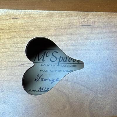 Sale Photo Thumbnail #139: This is signed by George Looney, and features walnut construction with faux mother of pearl tuners. There is a paper label on the inside. Gently used. Includes original case. Pre-auction estimate: $200-$300. [SR]