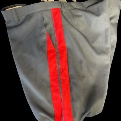 Sale Photo Thumbnail #158: Includes a tunic and trousers. Possibly a prop uniform, reproduction, or for movie use. Includes medals, shoulder boards, ribbon bar, and more. This has been in a smoky environment, and needs to be cleaned. Pre-auction estimate: $150-$250. [JS]