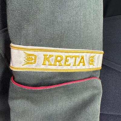 Sale Photo Thumbnail #155: Includes a tunic and trousers. Possibly a prop uniform, reproduction, or for movie use. Includes medals, shoulder boards, ribbon bar, and more. This has been in a smoky environment, and needs to be cleaned. Pre-auction estimate: $150-$250. [JS]