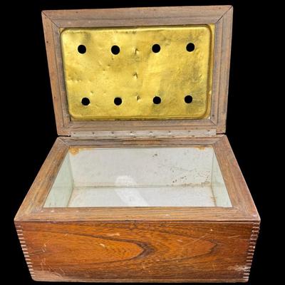 Sale Photo Thumbnail #161: Made in U.S.A. This has dovetailed wood construction, a glass lining, and a brass humidor unit on the underside of the lid. There is some age related wear. Not tested. Measurement: 11.5”L x 8”W x 6.5”H. [KD]