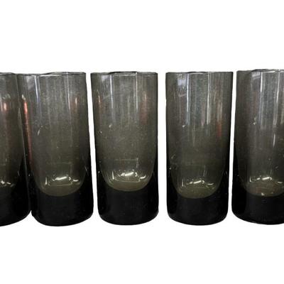 Sale Photo Thumbnail #177: Total of six smoky colored glasses. Made in Czechoslovakia. No obvious chips or cracks. Measurement: 6”H (each). Pre-auction estimate: $200-$300. [RE]