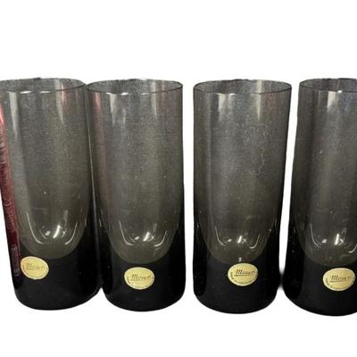 Sale Photo Thumbnail #180: Total of five smoke colored glasses. Made in Czechoslovakia. No obvious chips or cracks. Measurement: 5 1/8”H (each). Pre-auction estimate: $200-$300. [RE]