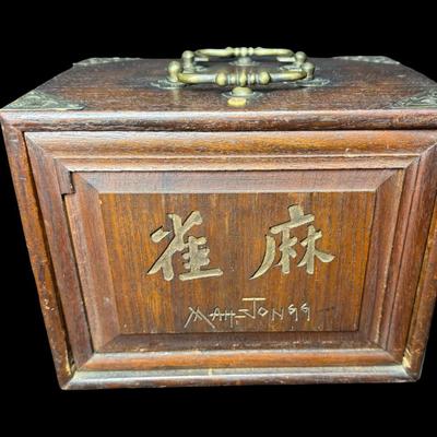 Sale Photo Thumbnail #199: Includes 144 ivory and bamboo tiles, counting tiles, and dice, in a five-drawer dovetailed wood box. Measurement: 9.5”L x 7”W x 7.5”H (box). Pre-auction estimate: $250-$350. **Winning bidder must present valid Florida ID at local auction pickup.** [