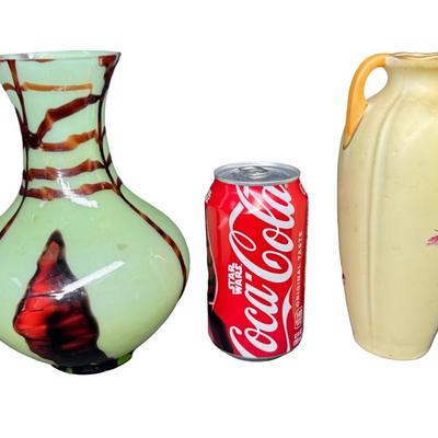 Sale Photo Thumbnail #201: Includes a double handled porcelain vase (7.5”H), and a uranium glass vase (7.5”H). Total of two pieces. [MA]