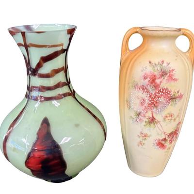 Sale Photo Thumbnail #200: Includes a double handled porcelain vase (7.5”H), and a uranium glass vase (7.5”H). Total of two pieces. [MA]