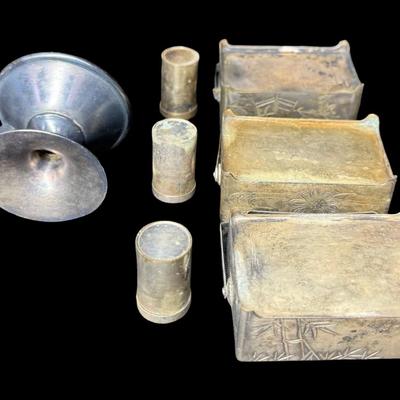 Sale Photo Thumbnail #242: Includes three salt and pepper service pieces, and a small oil lamp. The salt and pepper pieces are chased with an Asian motif. Total of four pieces. [KD]