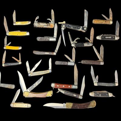 Sale Photo Thumbnail #246: Includes Kabar, Camper, Barlow, Puma, and more. Total of 22 pieces. Some pieces have age related wear, including stained/rusted blades, and possibly some chipped or cracked handles. [KD]