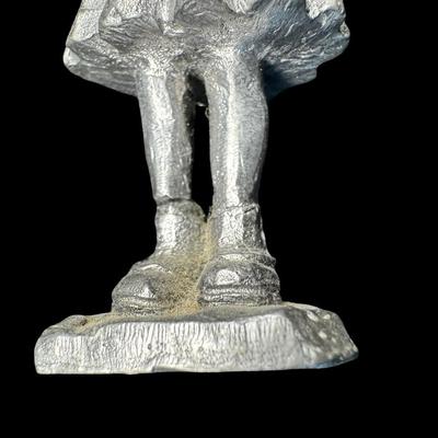 Sale Photo Thumbnail #280: NOS. Includes Danny, Dinah, Ray, Kathy, Sandy, and more. Total of seven pieces. The little girl with a book has a cracked leg. There is storage related wear with some patina. Measurement of tallest: 4.25”H. [SR]