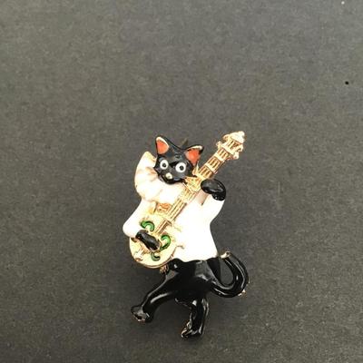 Sale Photo Thumbnail #173: Very cute black and white enamel cat playing banjo brooch please see attached photos