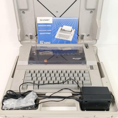 LOT 38: Sharp PA-3250 Electric Typewriter, Bates Heavy Duty Stapler, Rhodia Notepads & More