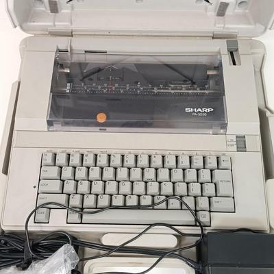 LOT 38: Sharp PA-3250 Electric Typewriter, Bates Heavy Duty Stapler, Rhodia Notepads & More