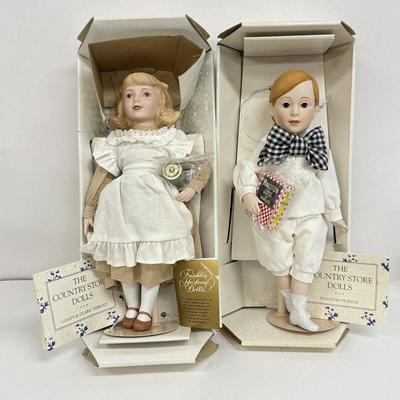 LOT 42: The Country Store Franklin Heirloom Porcelain Dolls: Barley Boy & Sewing Thread Girl