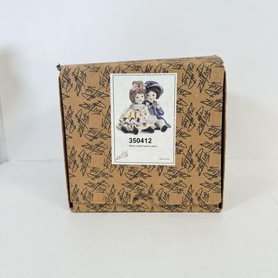 LOT 46: Boxed Porcelain Figurines: Paul Sebastian Collection, Hummel Club & More